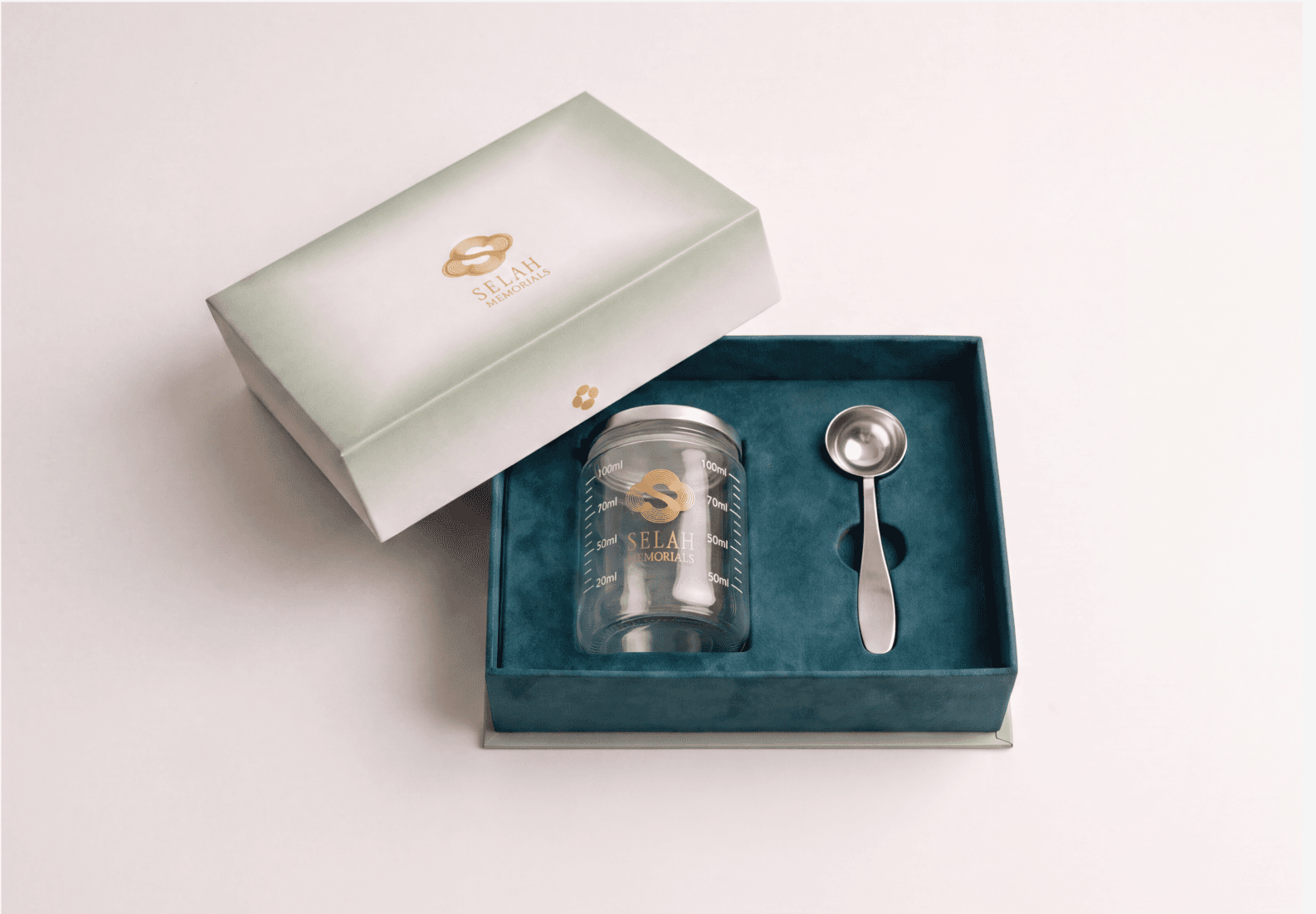 The Selah Kit box, open, with glass vial and scoop